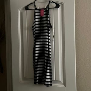Large black n white beach sun dress are beach wear